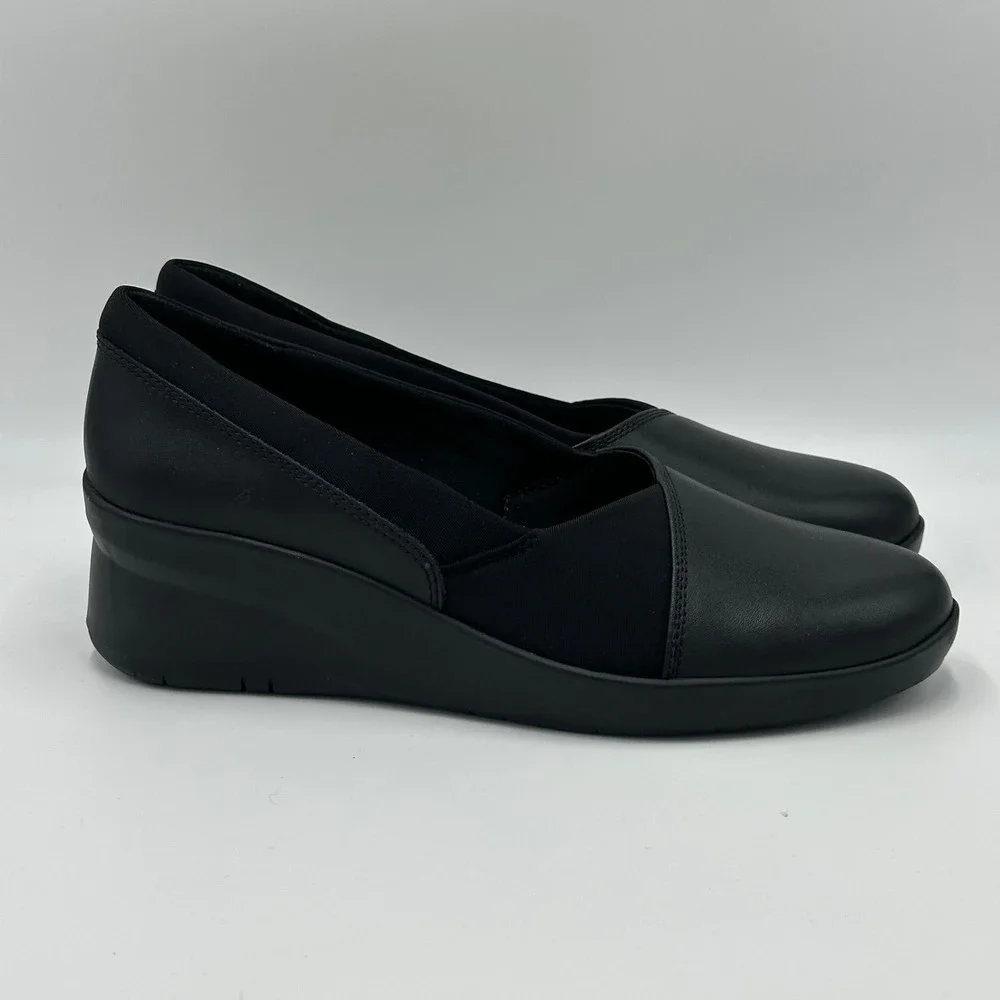 NWD Clarks Suttyn Walk Black Leather Wedge Slip On Shoes Womens Size 8.5 Comfort
